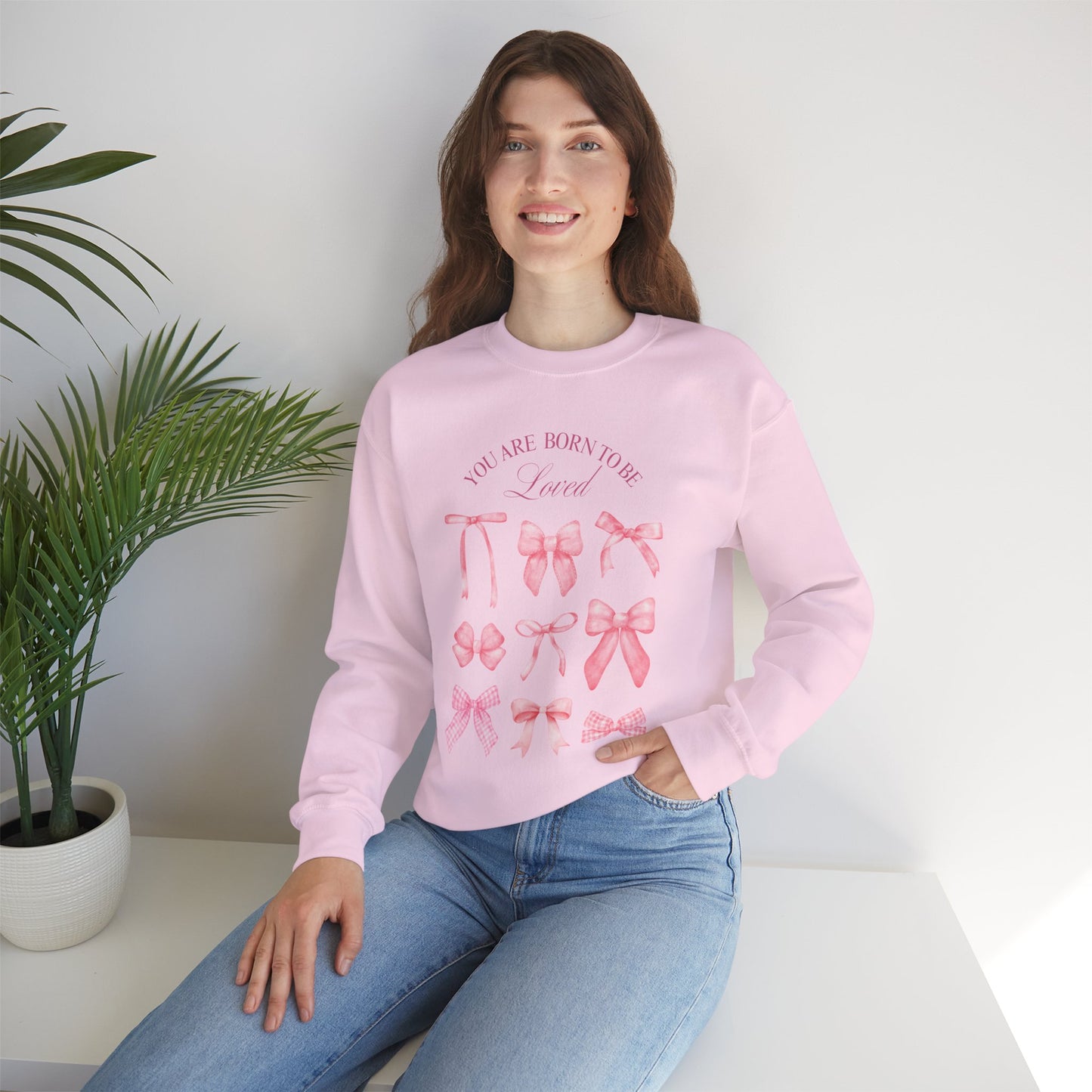 Pink Bow Crewneck Sweatshirt – “You Are Born to Be Loved” Graphic Pullover, Cozy Gift for Her, Birthday & Casual Wear - Wolf Aura Co