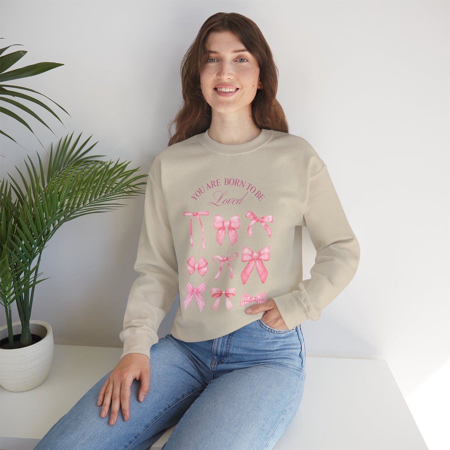 Pink Bow Crewneck Sweatshirt – “You Are Born to Be Loved” Graphic Pullover, Cozy Gift for Her, Birthday & Casual Wear - Wolf Aura Co