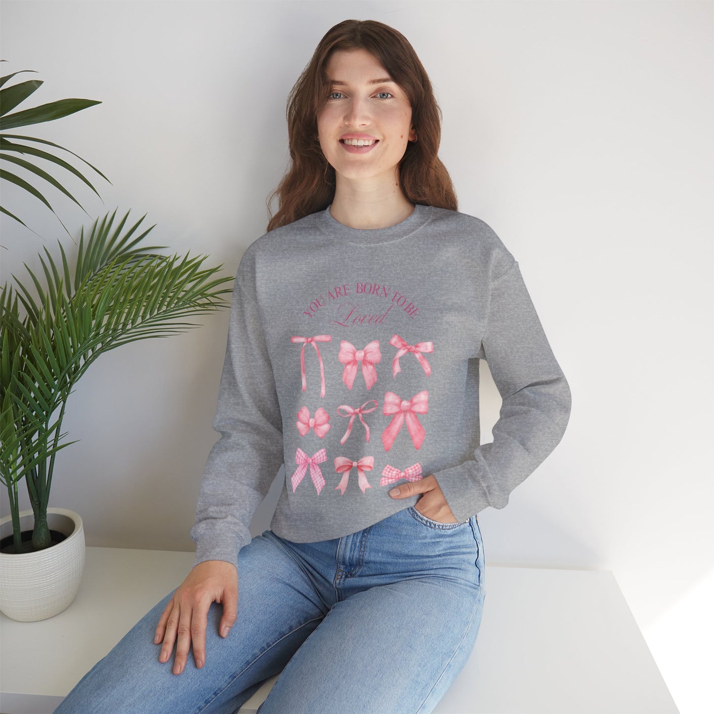 Pink Bow Crewneck Sweatshirt – “You Are Born to Be Loved” Graphic Pullover, Cozy Gift for Her, Birthday & Casual Wear - Wolf Aura Co