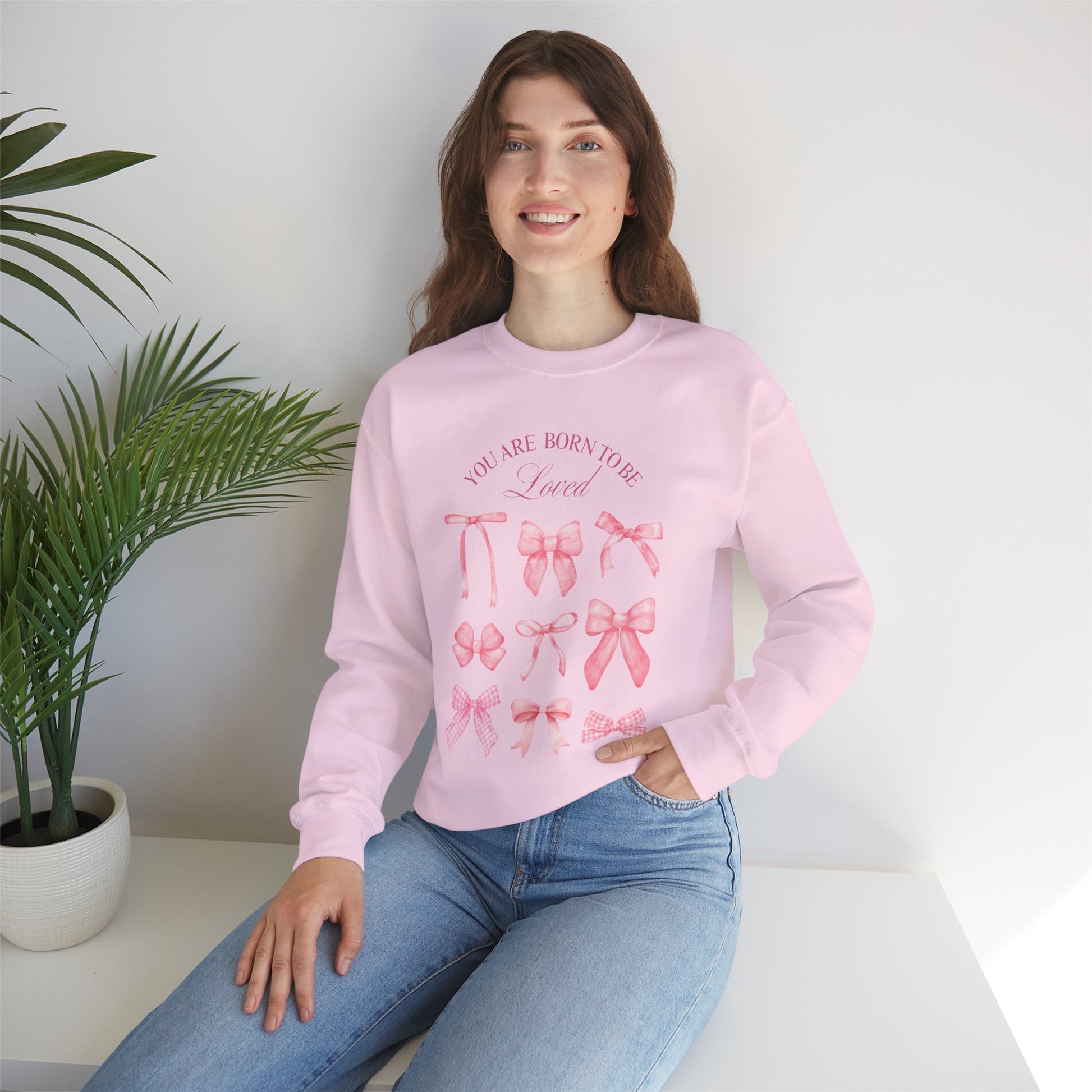 Pink Bow Crewneck Sweatshirt – “You Are Born to Be Loved” Graphic Pullover, Cozy Gift for Her, Birthday & Casual Wear - Wolf Aura Co